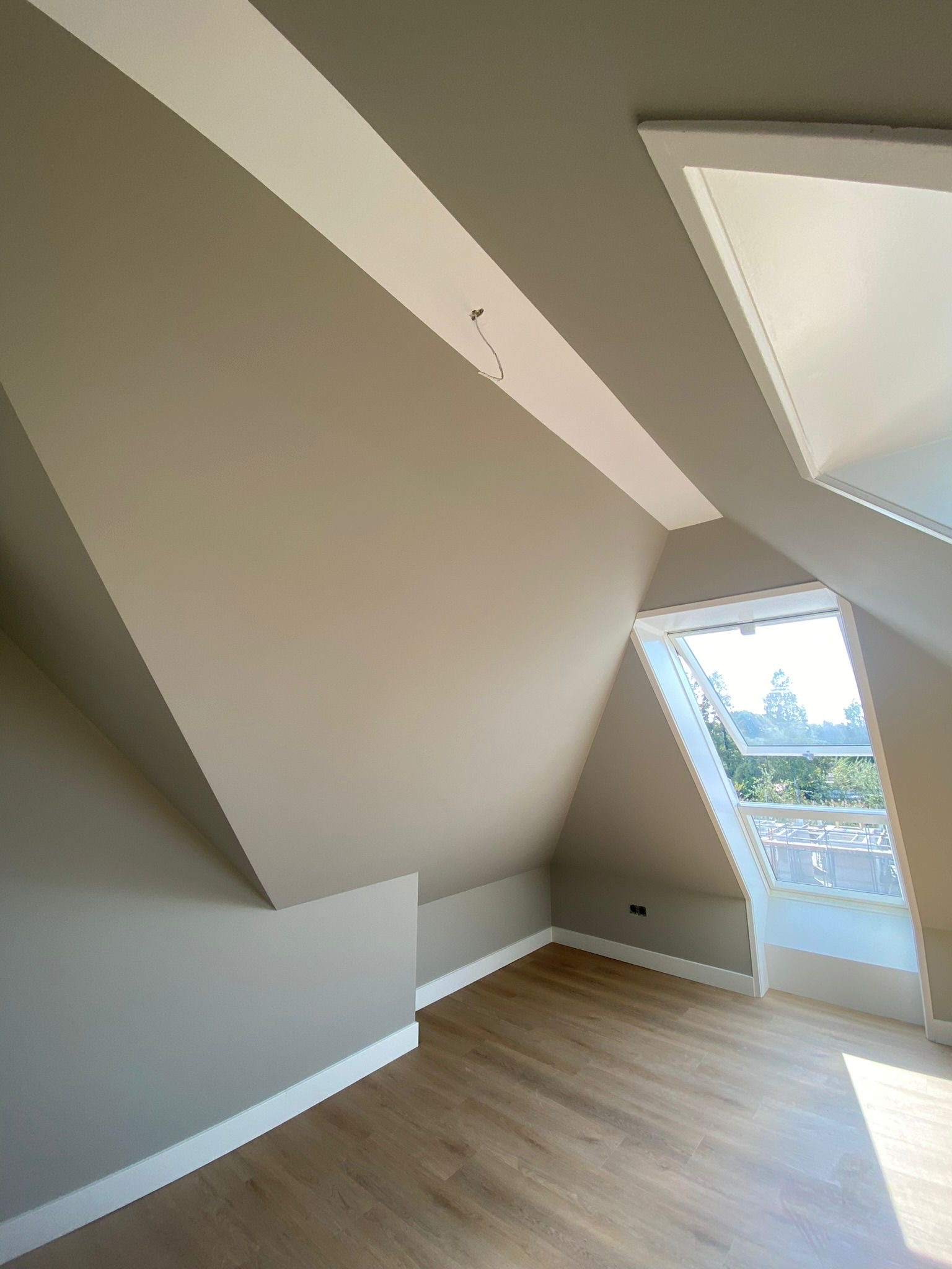 Eigen project: afgewerkte zolder met strakke wanden